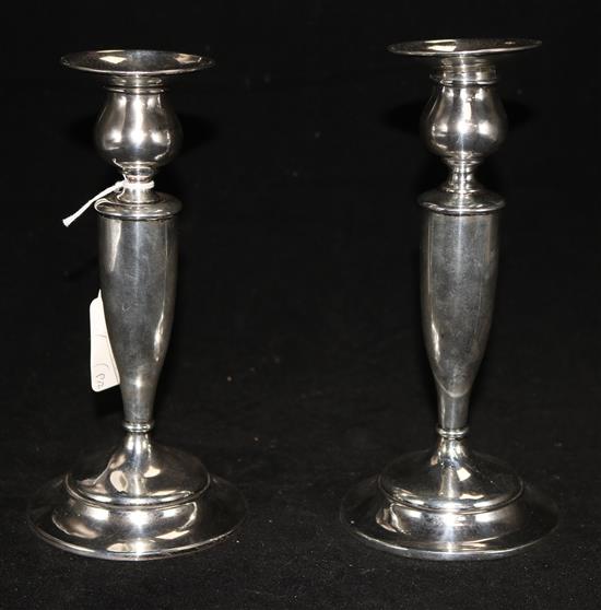 A pair of sterling silver candlesticks, 8in.